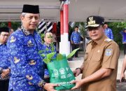 Pj Gub Sulsel Serahkan 4.100 Bibit Pohon dan 2.341 SK PPPK di Hari Kesadaran Nasional